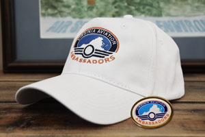 Sombrero y alfiler de embajadores